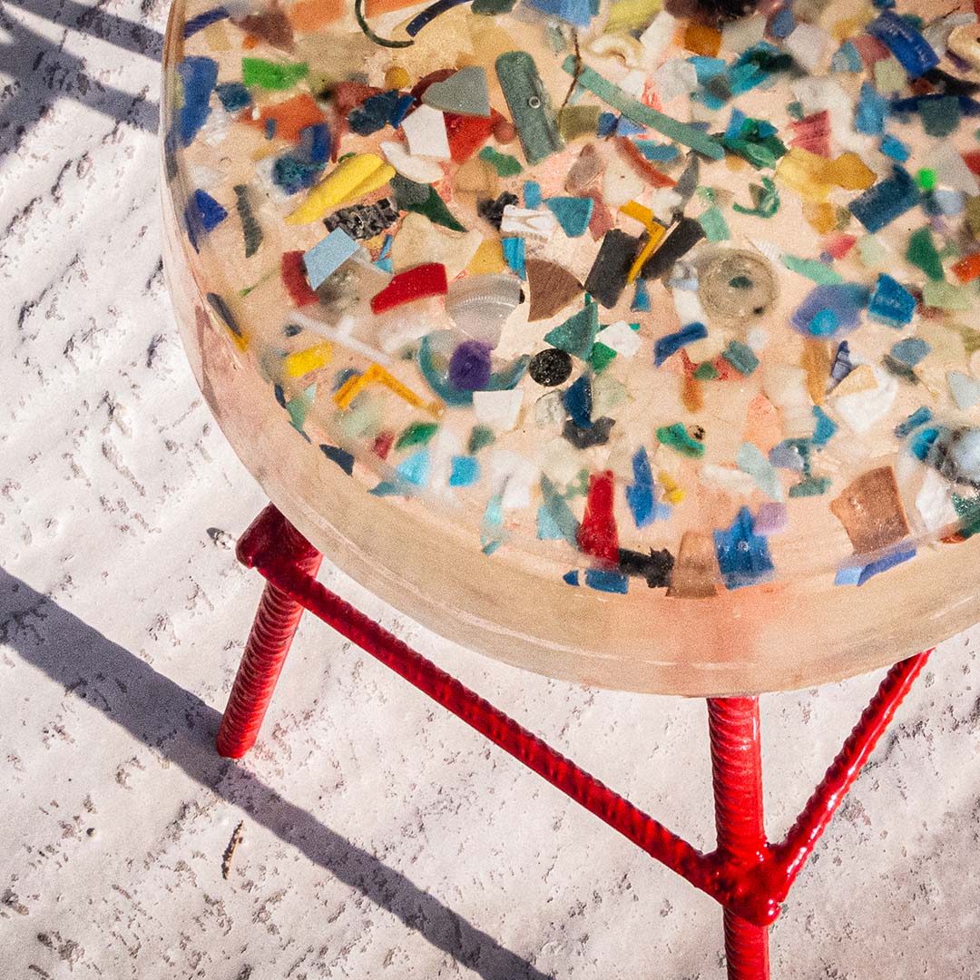 Stool made of epoxy resin and plastics from the beach