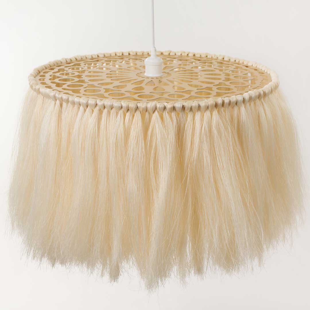 A boho sisal lamp made from natural-colored sisal fibers