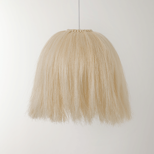 A handwoven natural sisal pendant lamp