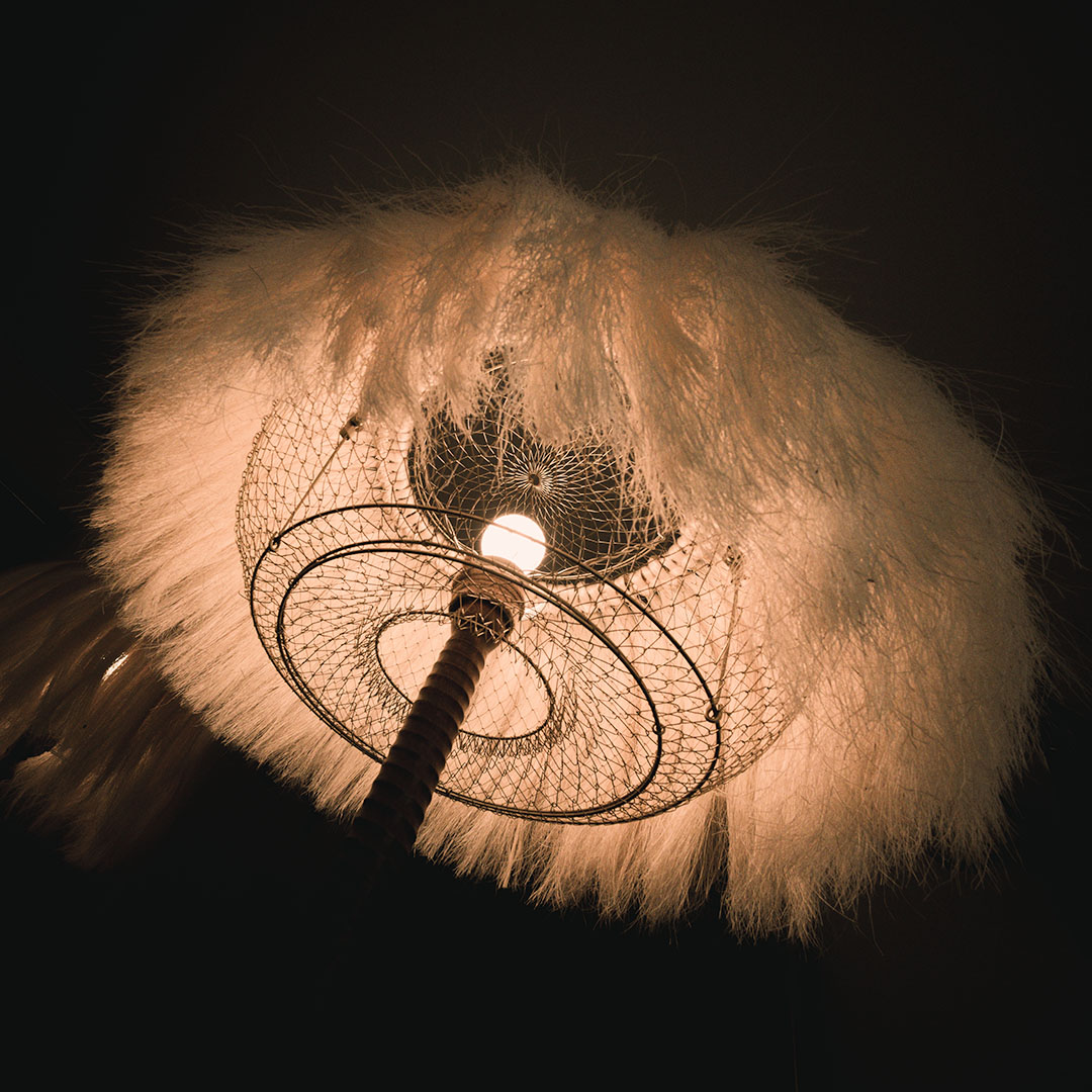 A floor lamp made with sisal fibers