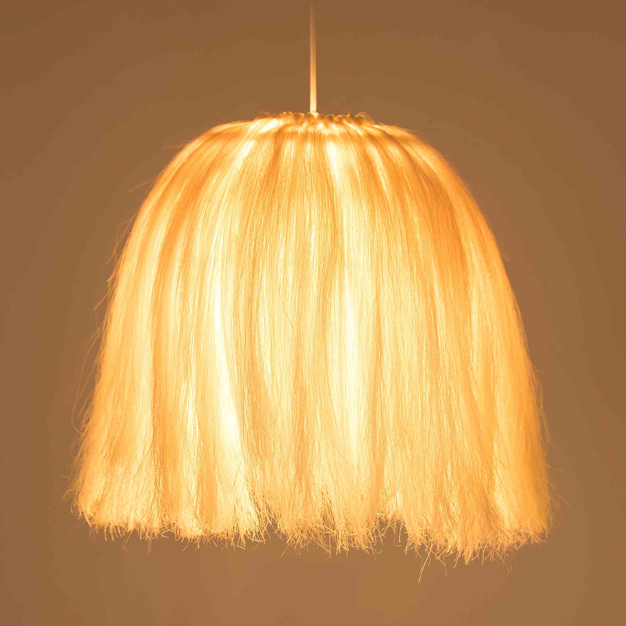 A pendant lamp made of natural fiber adding warmth to any room