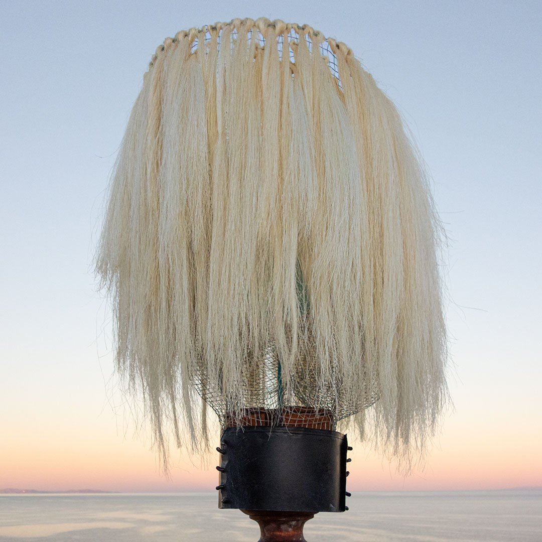 Closeup of lamp with sisal fibers, wood and sheet metal